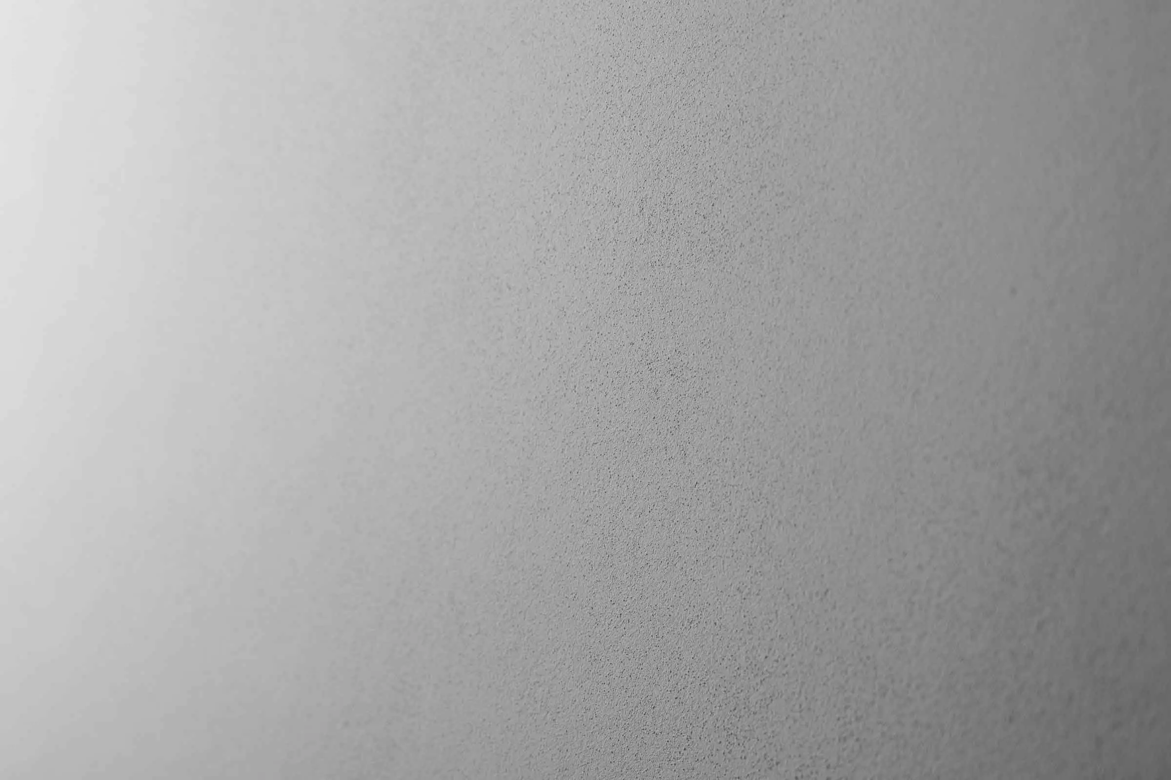 Filcana žbuka, fasadna žbuka StoSignature Texture Fine 40, fina siva žbukana površina