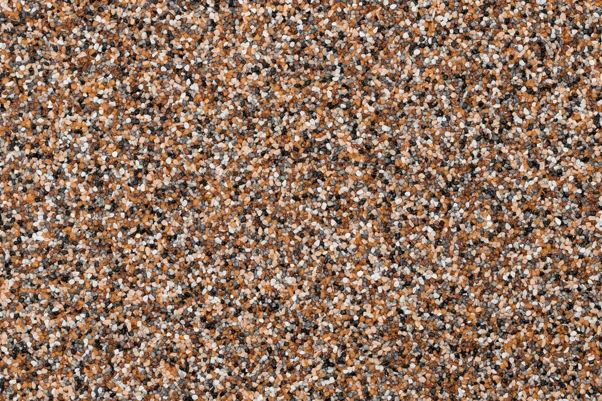 Oberfläche Buntsteinputz in Kornstärke K 1,5 StoSuperlit, Orange-grau, mittel